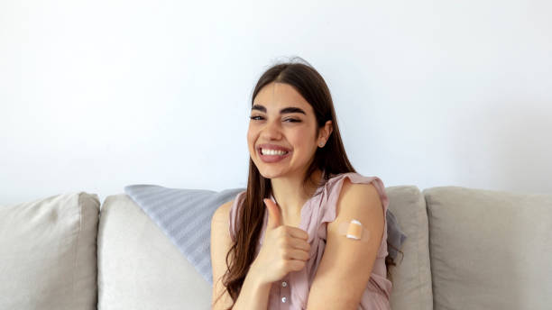 istock Young woman after vaccination. 1321720175