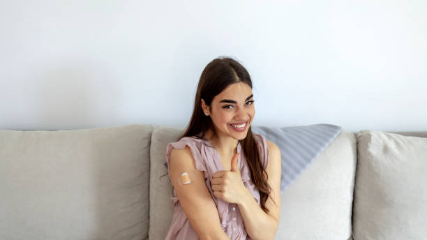 istock Young woman after vaccination. 1321720239