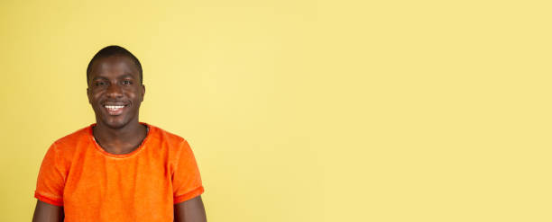 istock African young male portrait isolated over studio background with copyspace 1321722400