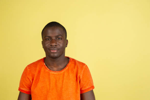 istock African young male portrait isolated over studio background with copyspace 1321722401