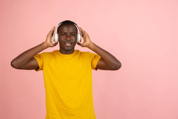 istock Male portrait isolated over pink studio background with copyspace 1321722463