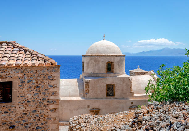 istock Monemvasia: A typical orthodox chapel facing the Aegean Sea. 1321727699