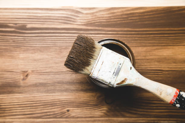 istock paint with brush and wood 1321728434