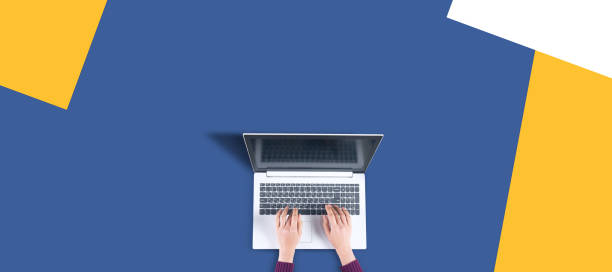 istock woman working in computer on the color table 1321728571