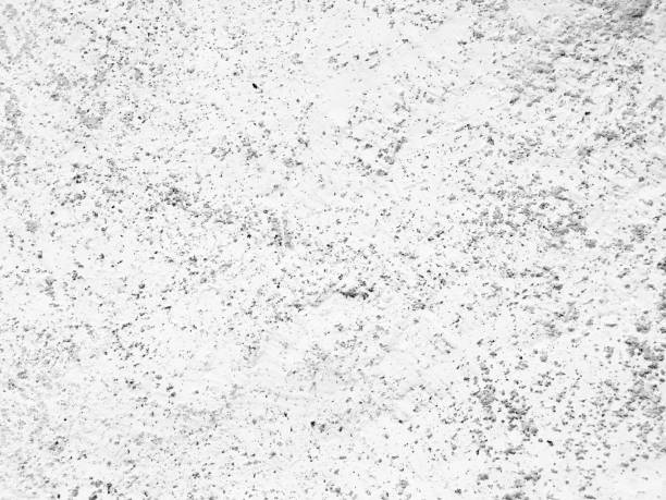 석회로 그려진 집 안의 오래된 벽 - 벡터의 사포와 유사한 다공성 표면이있는 고르지 않은 구조 - 추상적 인 지저분한 원시 질감 배경 - 보이는 자갈과 아래 원시 콘크리트의 회색 음영 - 높은 상� - concrete wall concrete backgrounds stone stock illustrations