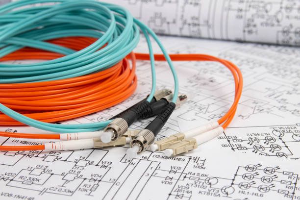 fiber optic patch cord cable on electrical engineering drawings - computer plan fiber optic engineer imagens e fotografias de stock