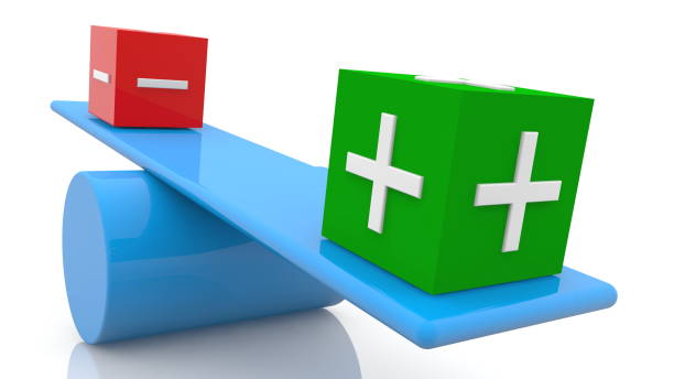 istock Concept plus and minus on seesaws 1321734345