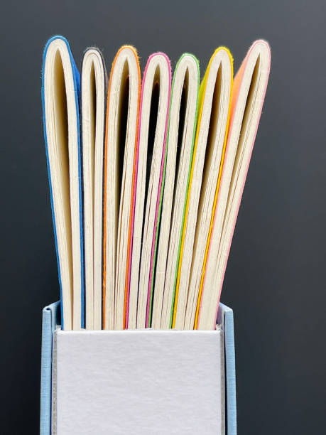 istock Diaries in a box on black background 1321735011