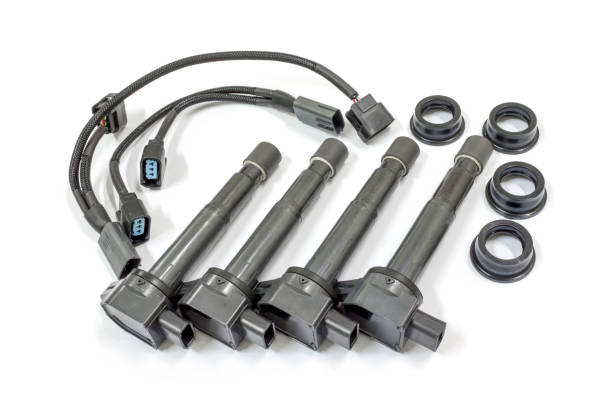 istock Ignition coil of car engine on white background, isolated, Car maintenance service. 1321739535