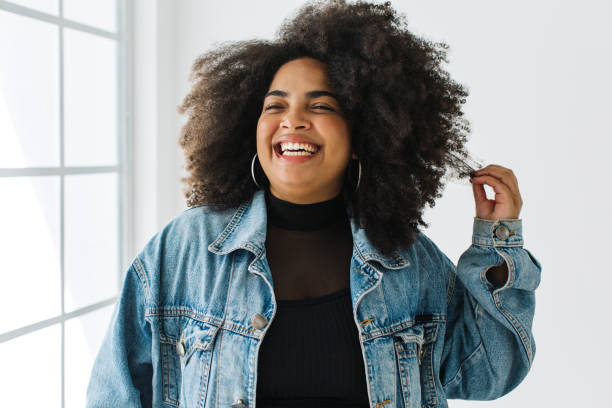 istock Beautiful woman smiling in demin jacket 1321741067