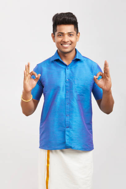 istock Cheerful handsome Indian man showing ok sign 1321754535