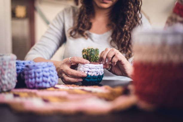 istock Woman producing crochet art 1321754657