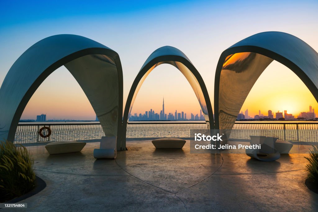 Dubai city skyline at dusk or evening. A beautiful view from Dubai Creek Harbour. Dubai Stock Photo