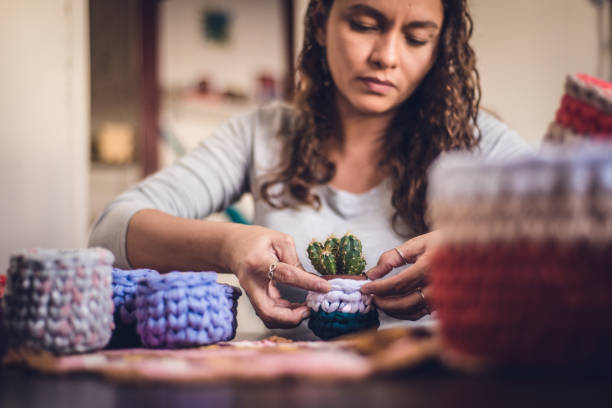 istock Entrepreneur who produces crochet organizes goods 1321754816