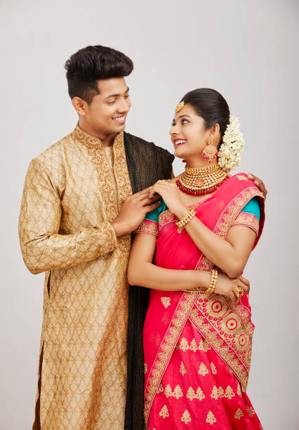 istock Attractive happy north Indian couple 1321754978