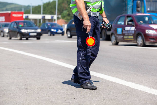 istock Police officer controlling traffic on the highway 1321760078