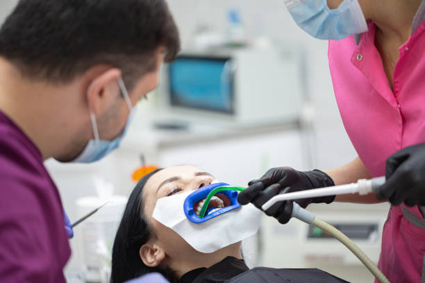 istock A woman at a dentist's teeth whitening appointment 1321761001
