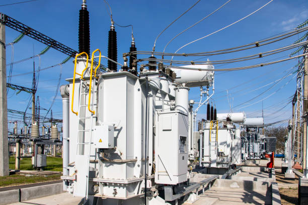 istock a powerful transformer substation with many connected high-voltage wires and cables, Transformers of various capacities and voltages. 1321762194
