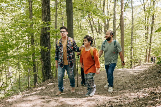 istock Walking in the forest with the family 1321765951