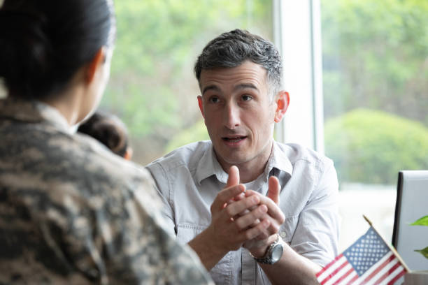 istock Mature financial planner meeting with a military solider. 1321768137