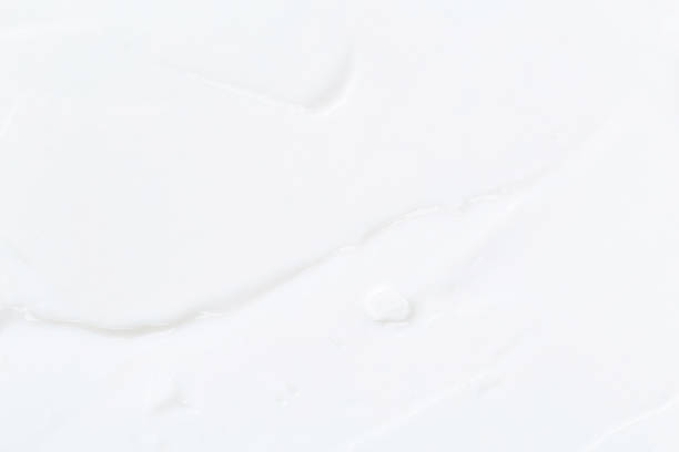 istock White Cosmetic Cream Isolated on White Background. Lipstick Smear. 1321768409