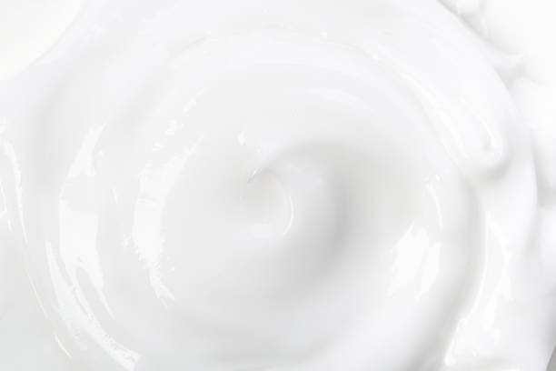 istock White Cosmetic Cream Isolated on White Background. Lipstick Smear. 1321768416