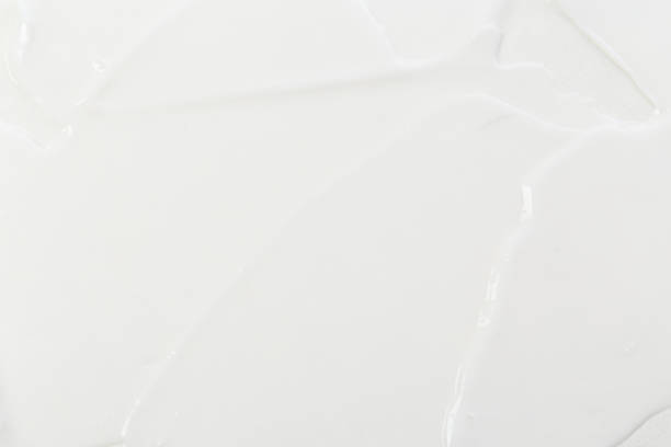 istock White Cosmetic Cream Isolated on White Background. Lipstick Smear. 1321769716