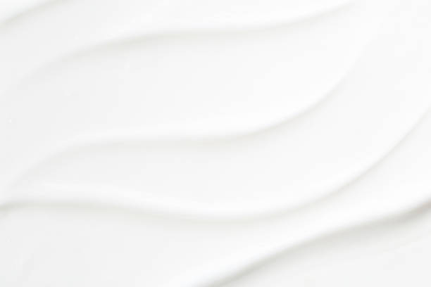 istock White Cosmetic Cream Isolated on White Background. Lipstick Smear. 1321769797