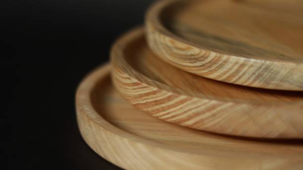 istock Stack of wooden plate 1321770386