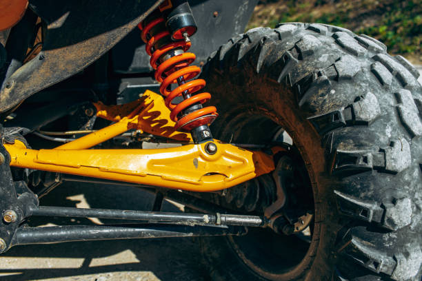 istock Shock absorber of ATV car close up 1321770428