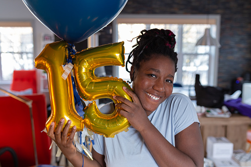 Girl showing Special Helium Ballon