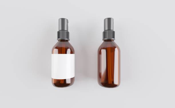 istock Amber Glass Spray Bottles Mockup 3D Illustration 1321773605