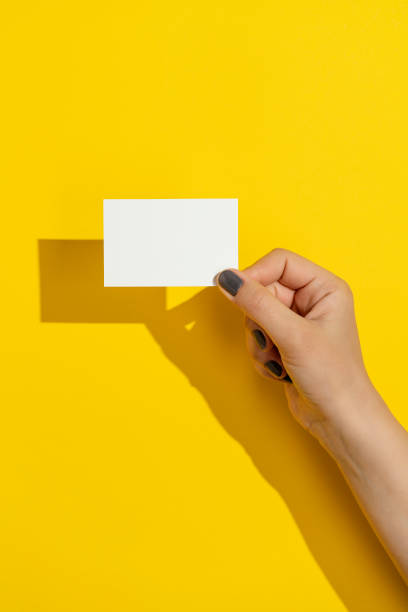 istock Hand holding blank business card 1321776343