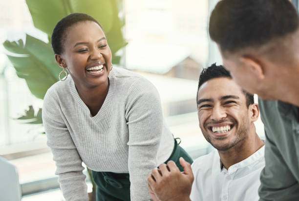 istock Shot of three colleagues having a discussion in a modern office 1321777651