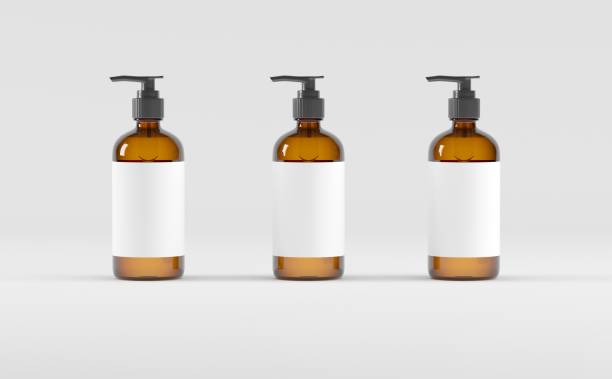 istock Amber Glass Bottles Pump Dispenser Soap Shampoo Liquid Mockup 3D Illustration 1321777732