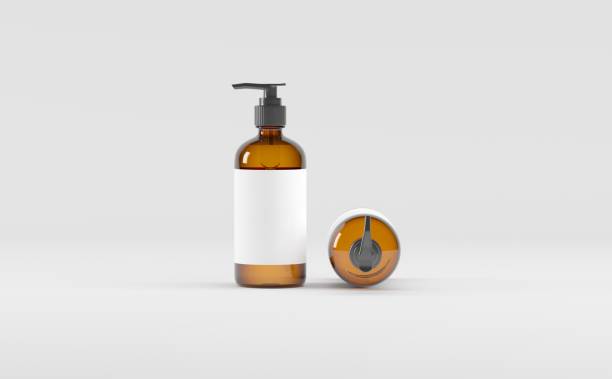 istock Amber Glass Bottles Pump Dispenser Soap Shampoo Liquid Mockup 3D Illustration 1321777783