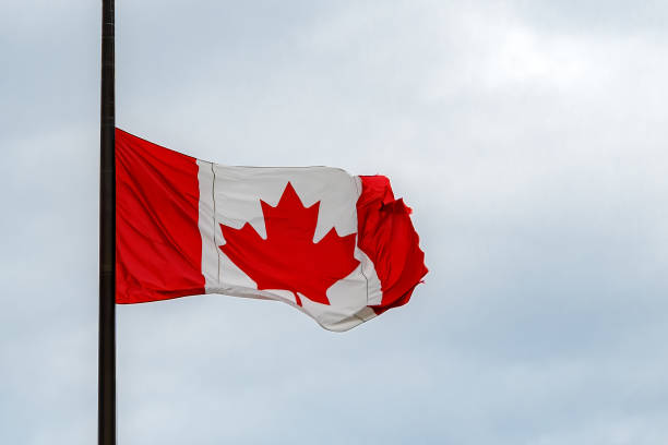 istock Canadian Flag At Half Mast 1321777933