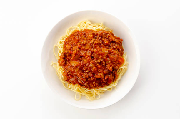 istock spaghetti with meat sauce on a white background 1321792732