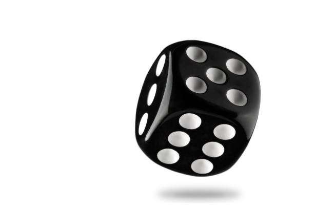 istock the dice are black with white dots, isolated on a white background for clipping 1321793275