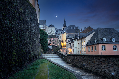 Luxembourg city street at night with St Michaels Church on background - Luxembourg City, Luxembourg