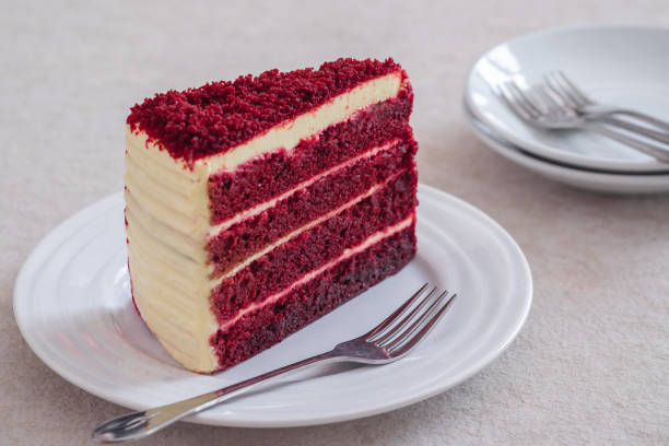 istock Red velvet cake on white plate 1321801065