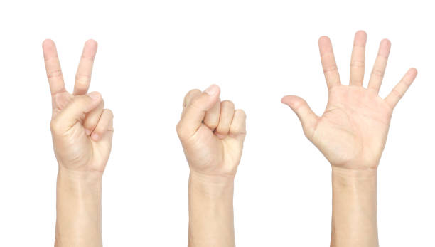 istock male hand gesture symbolizing as a rock, paper, scissors, game. 1321808189