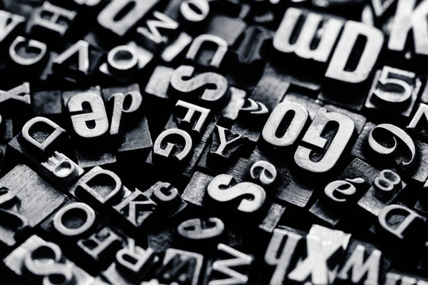 istock Vntage metal letterpress type background 1321813386