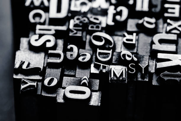 istock Vntage metal letterpress type background 1321813391