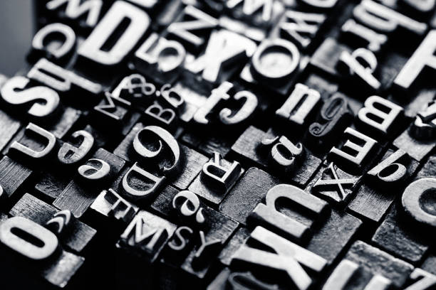 istock Vntage metal letterpress type background 1321813392
