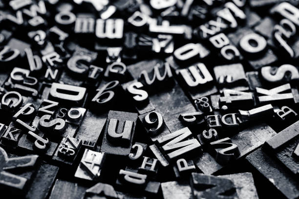 istock Vntage metal letterpress type background 1321813397