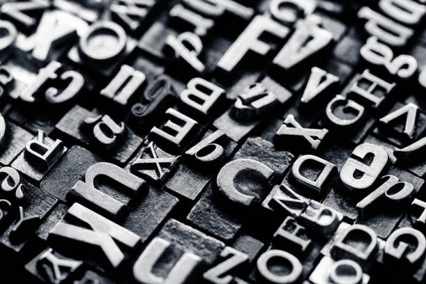 istock Vntage metal letterpress type background 1321813429