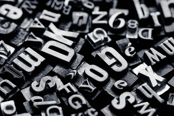 istock Vntage metal letterpress type background 1321813434