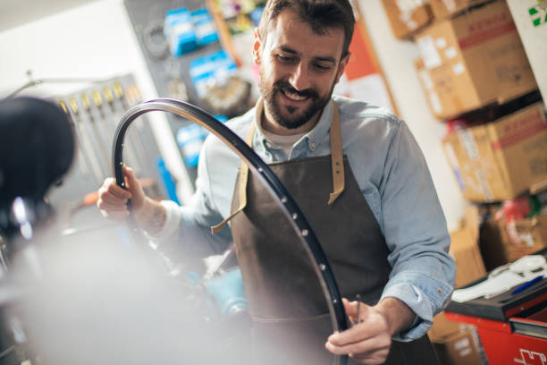 istock Taking care of town's bicycles 1321814575