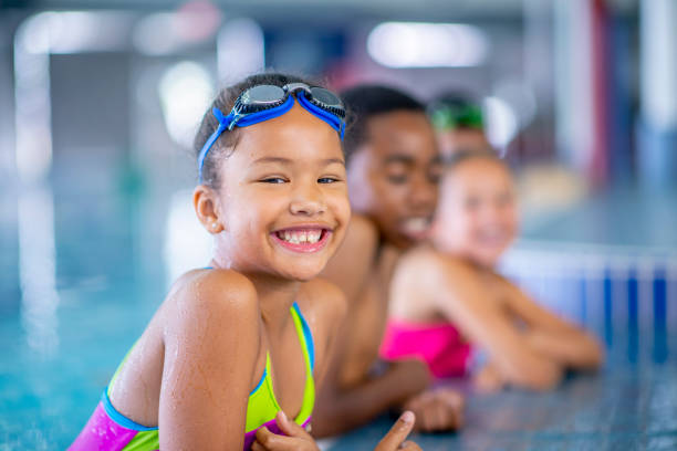 istock Friends at the pool 1321814777